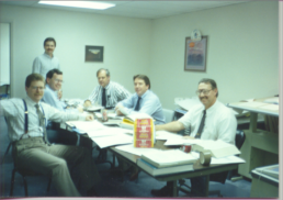 Group of men in office